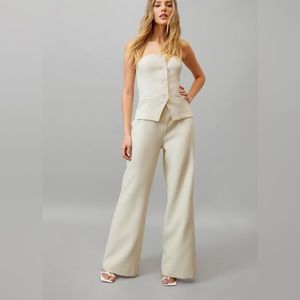 Nasty Gal cream jumpsuit . Never worn . Brand new